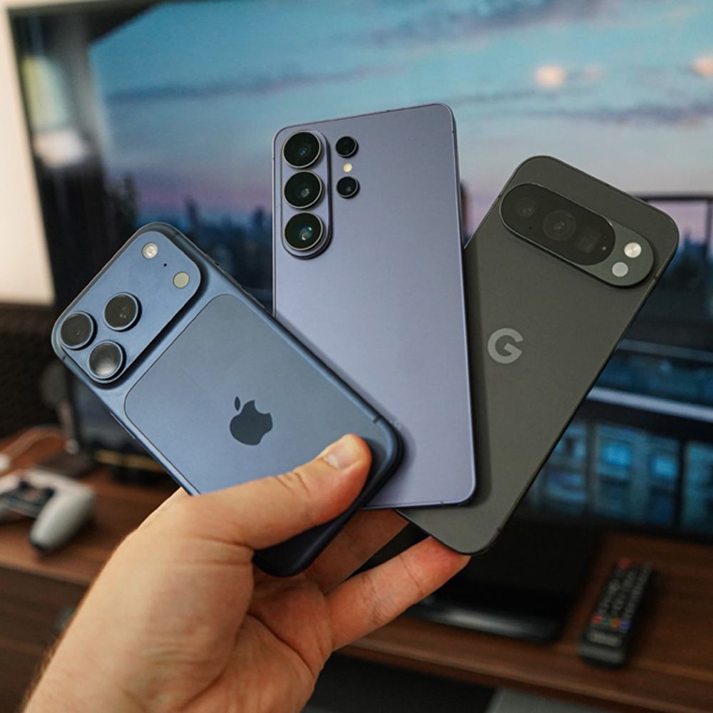 iPhone, Samsung Galaxy and Google Pixel handsets held together